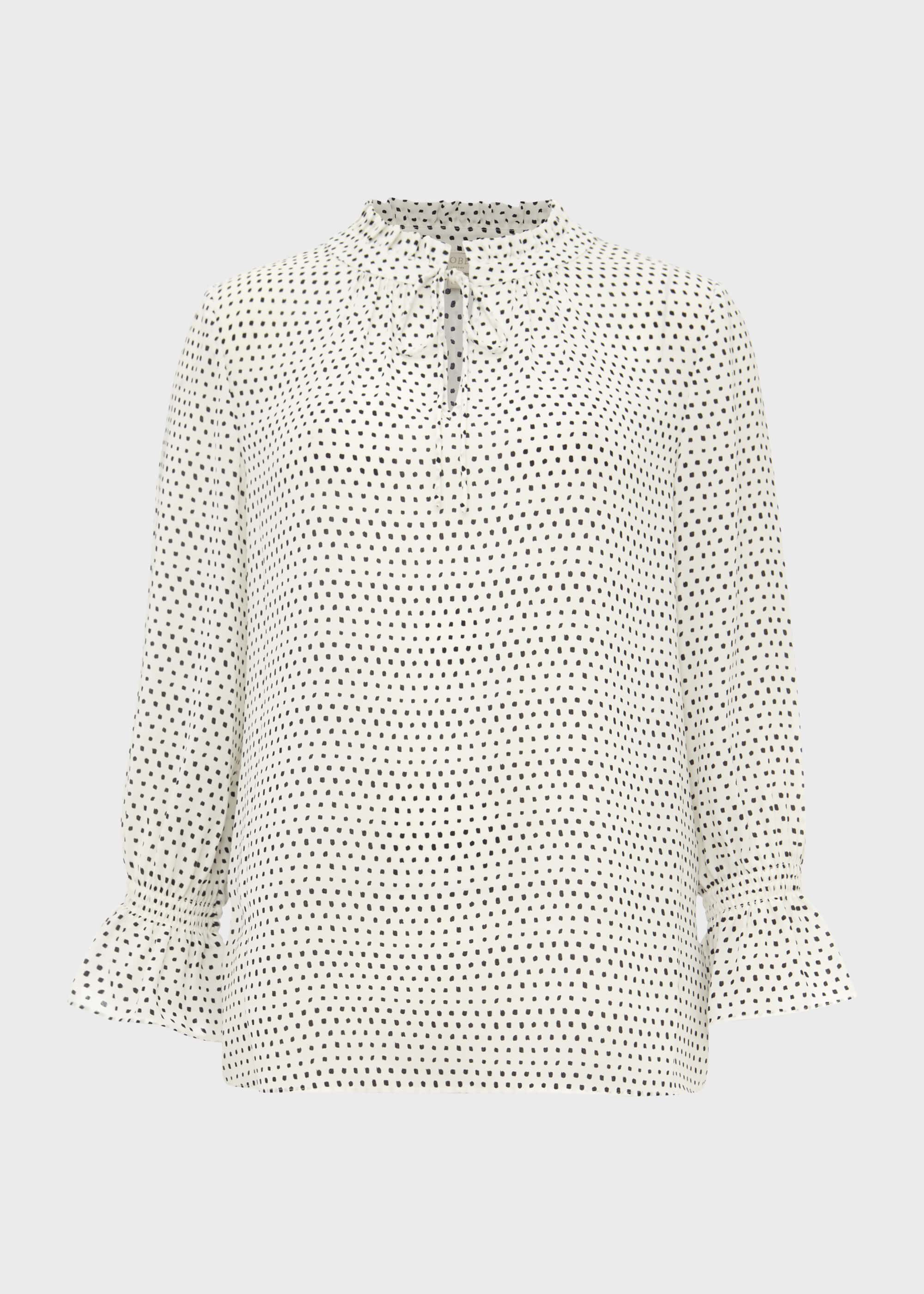 navy and white spotted blouse