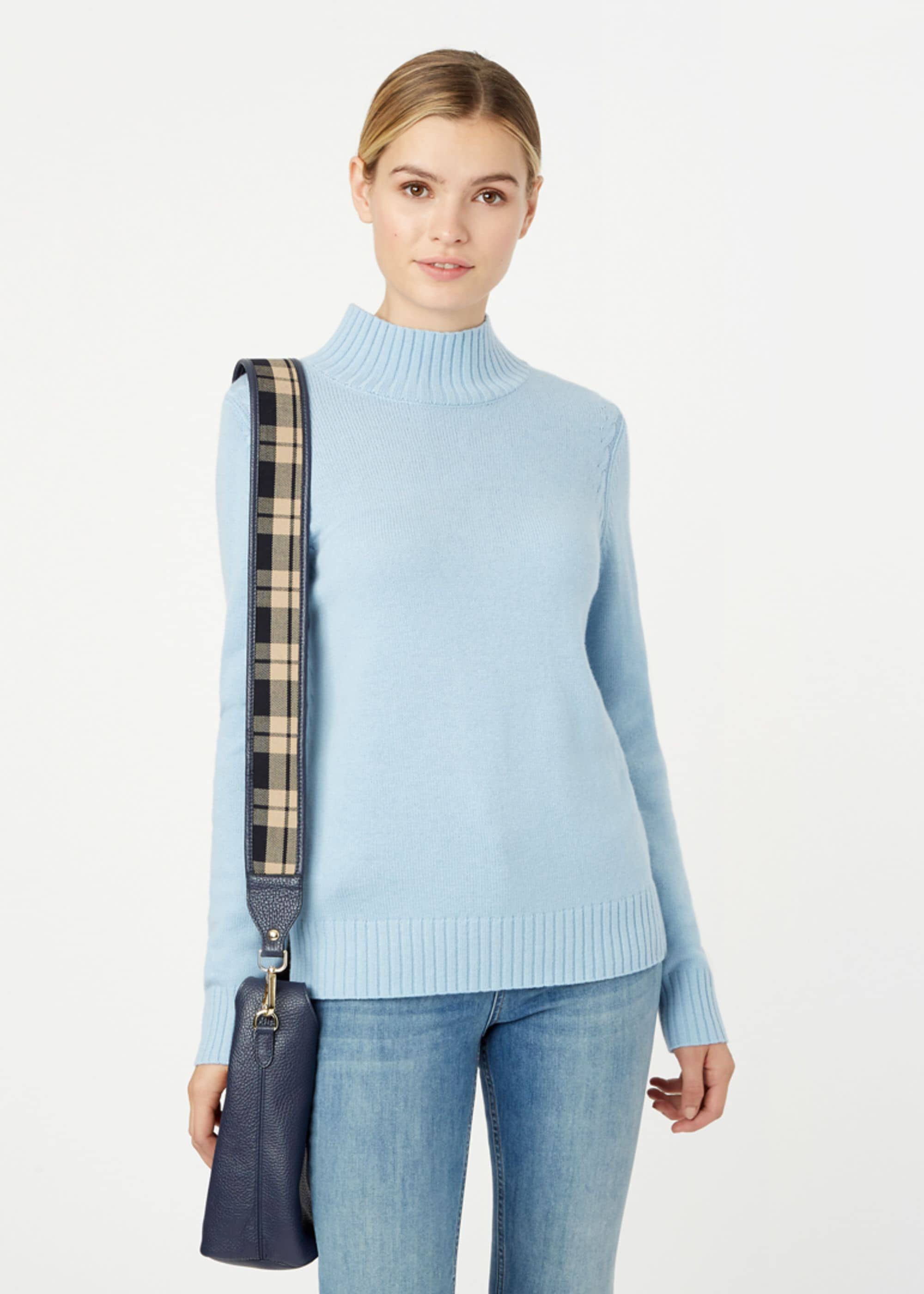 pale blue polo neck jumper