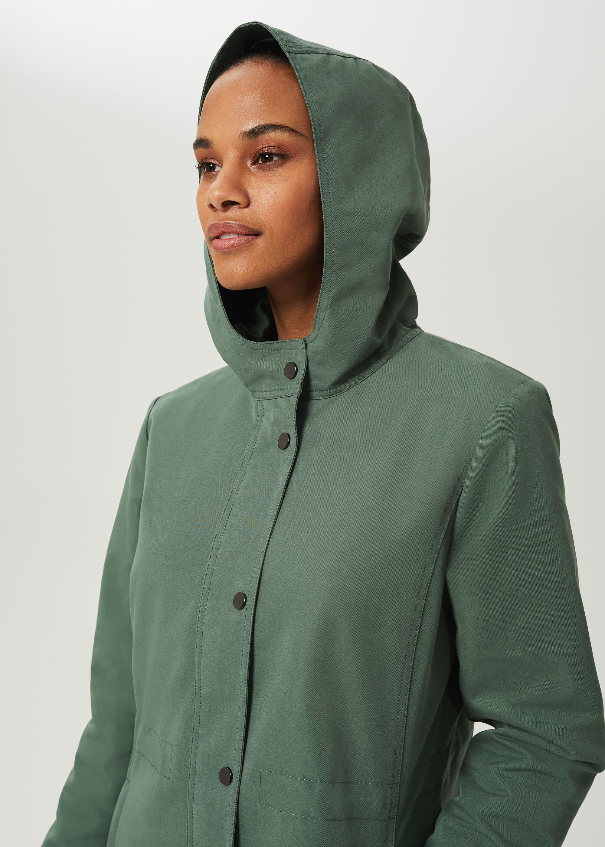 Green coat store with hood