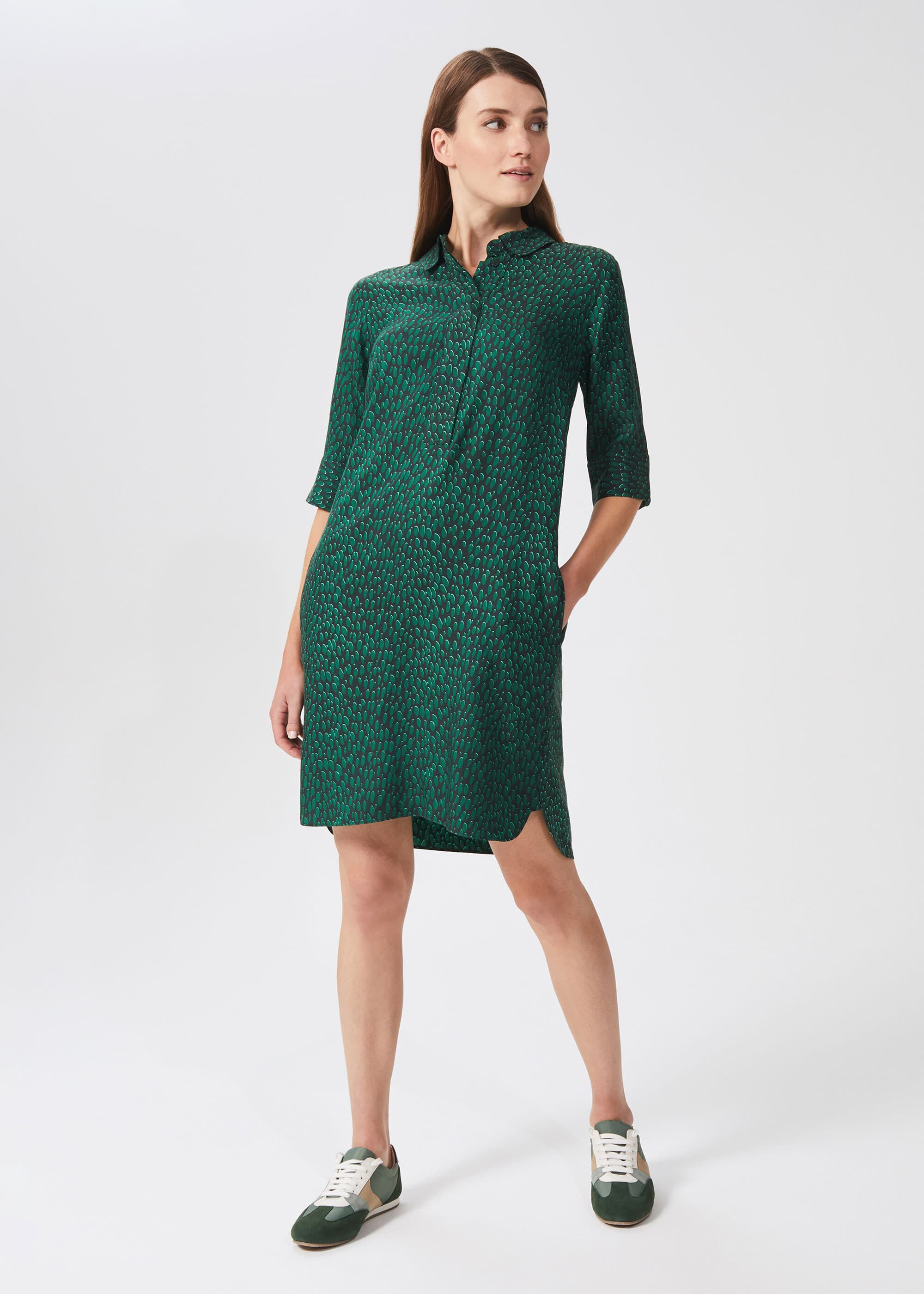 green and black spot dress