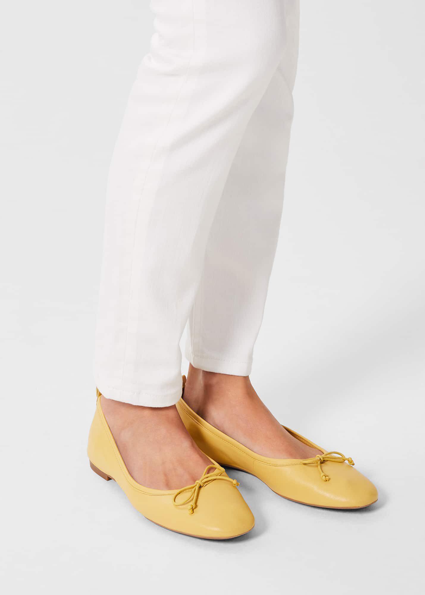 Pale yellow flats sales