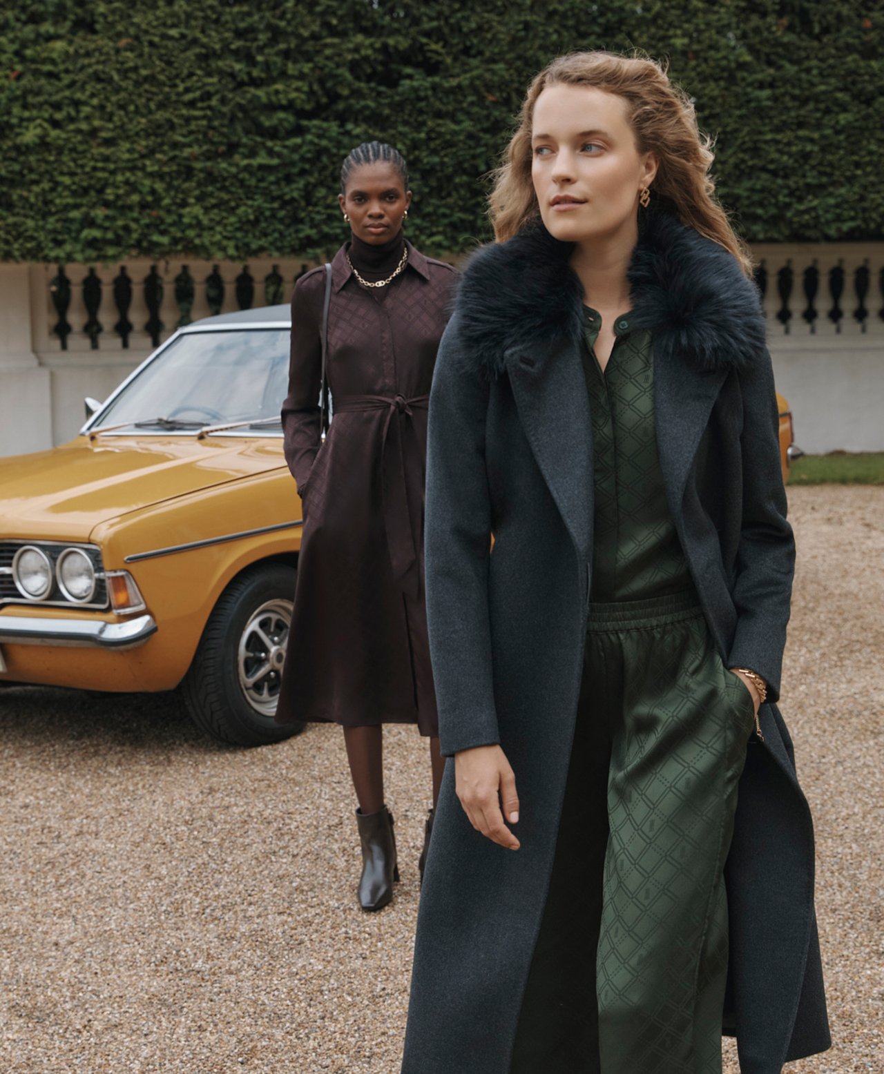 Women wearing Hobbs’ elegant outerwear and new-season staples.