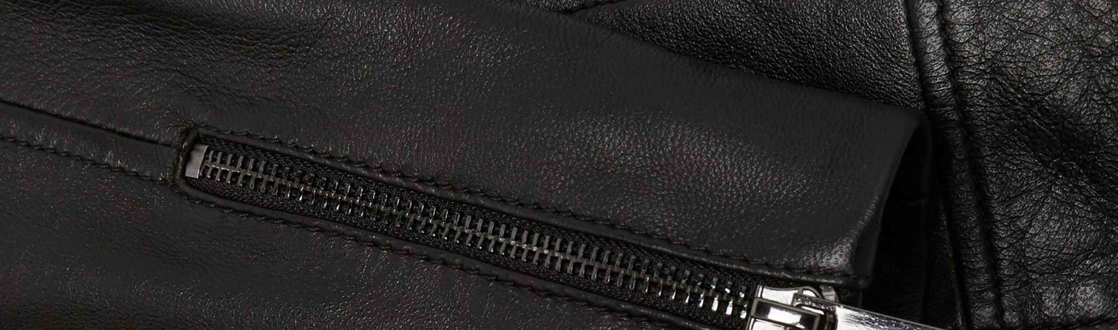 A close-up of the cuff of a Hobbs leather biker jacket.