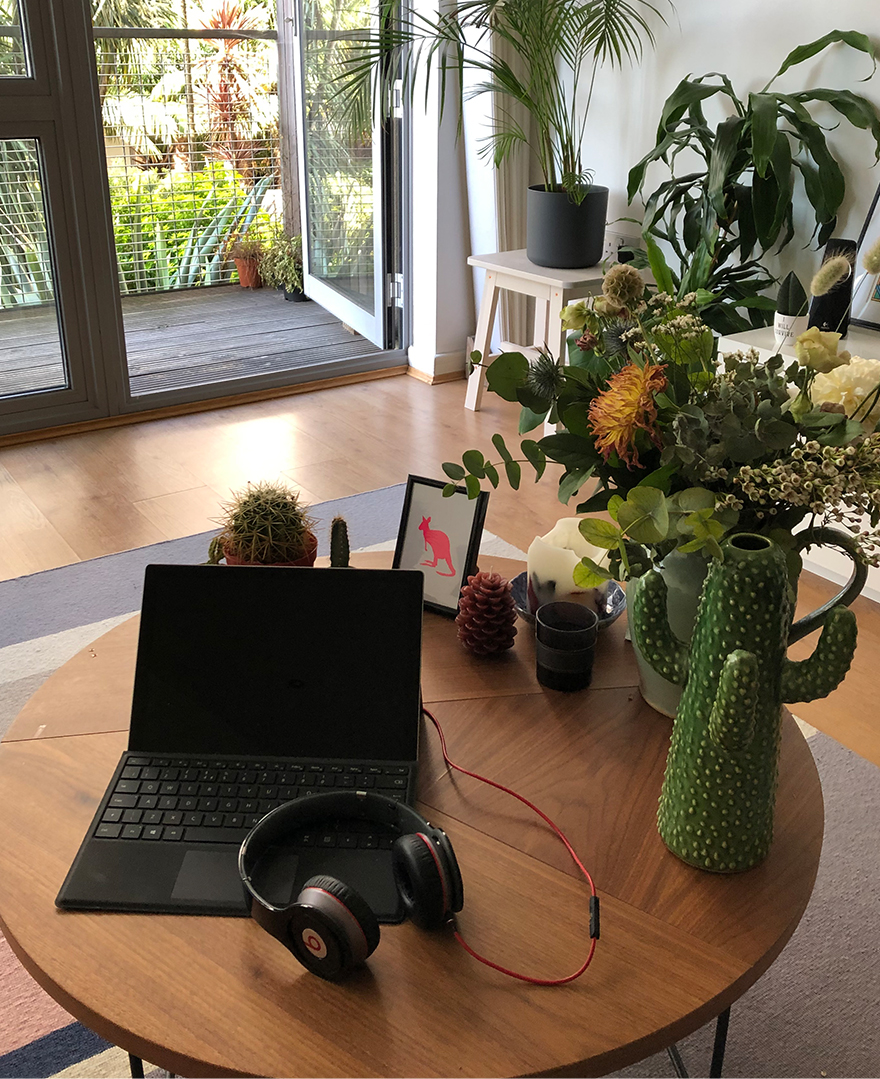 Algy's home office set up surronded by plants. 