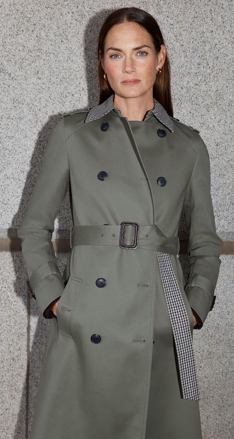 A woman wearing a Hobbs trench coat.