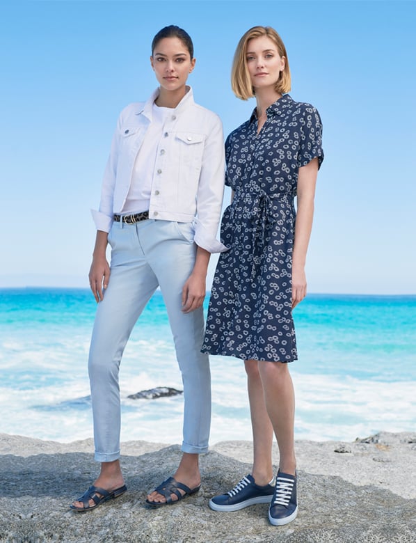 White Denim jacket on Light Blue Chinos and Navy Summer Dress with White Floral Print
