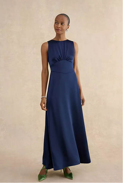 A woman wearing a Hobbs dress.