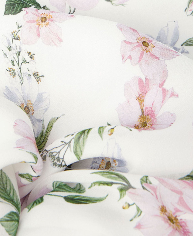 Close-up of rose floral print fabric.