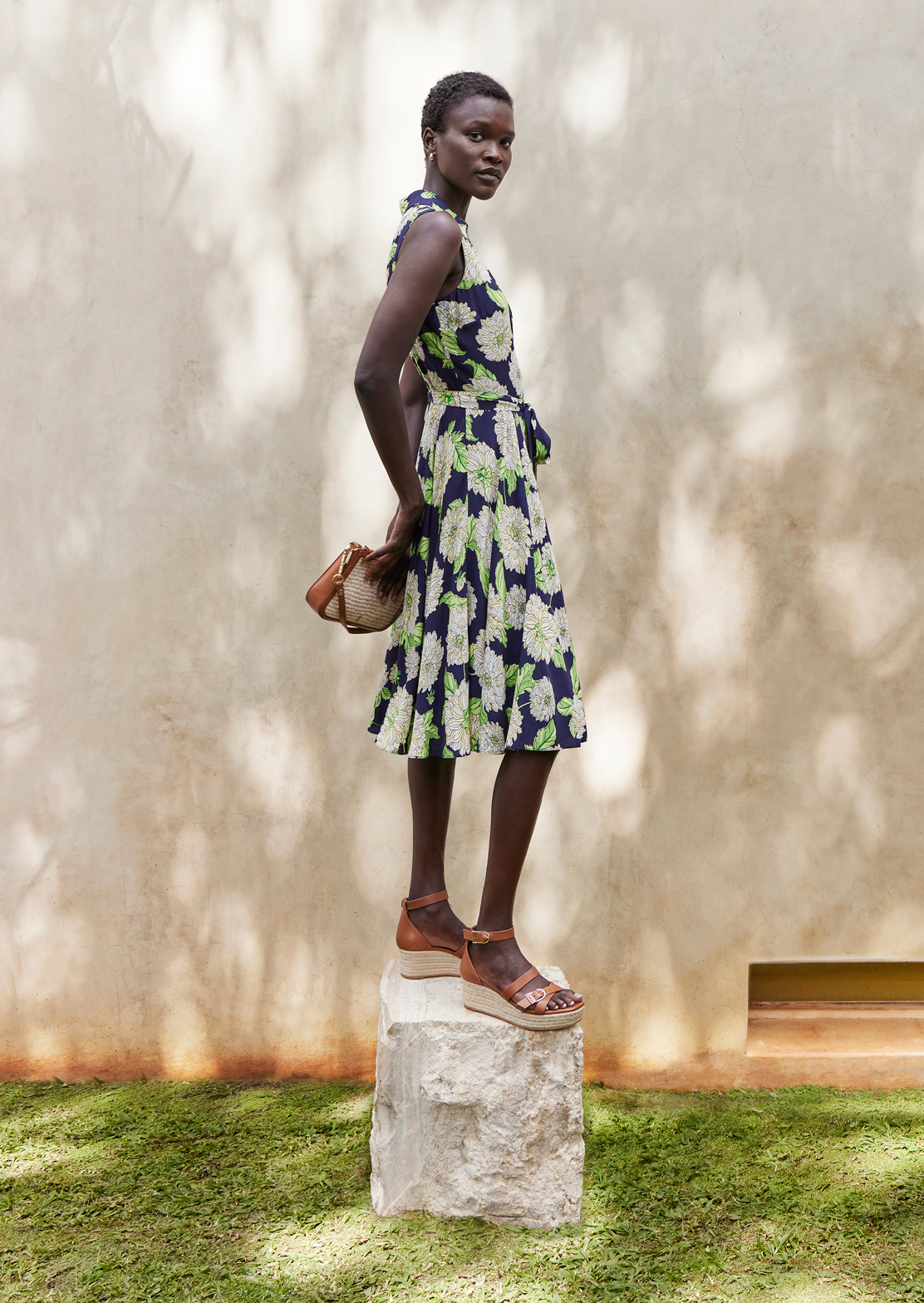 An image of a model wearing a Hobbs’ fit and flare dress.