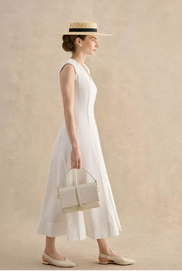 A woman wearing Hobbs dress.