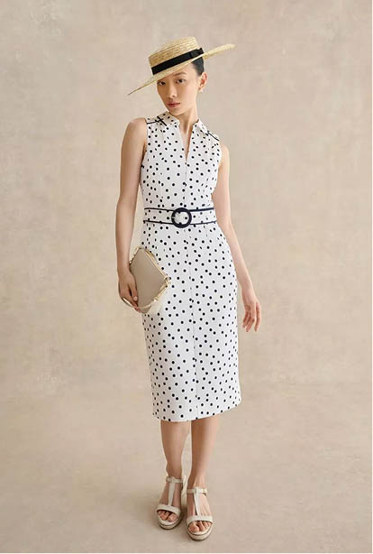 A woman wearing a Hobbs dress.