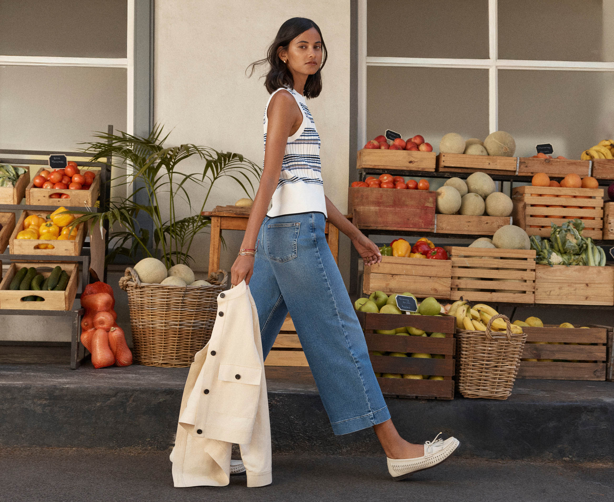 A woman wearing Hobbs denim.