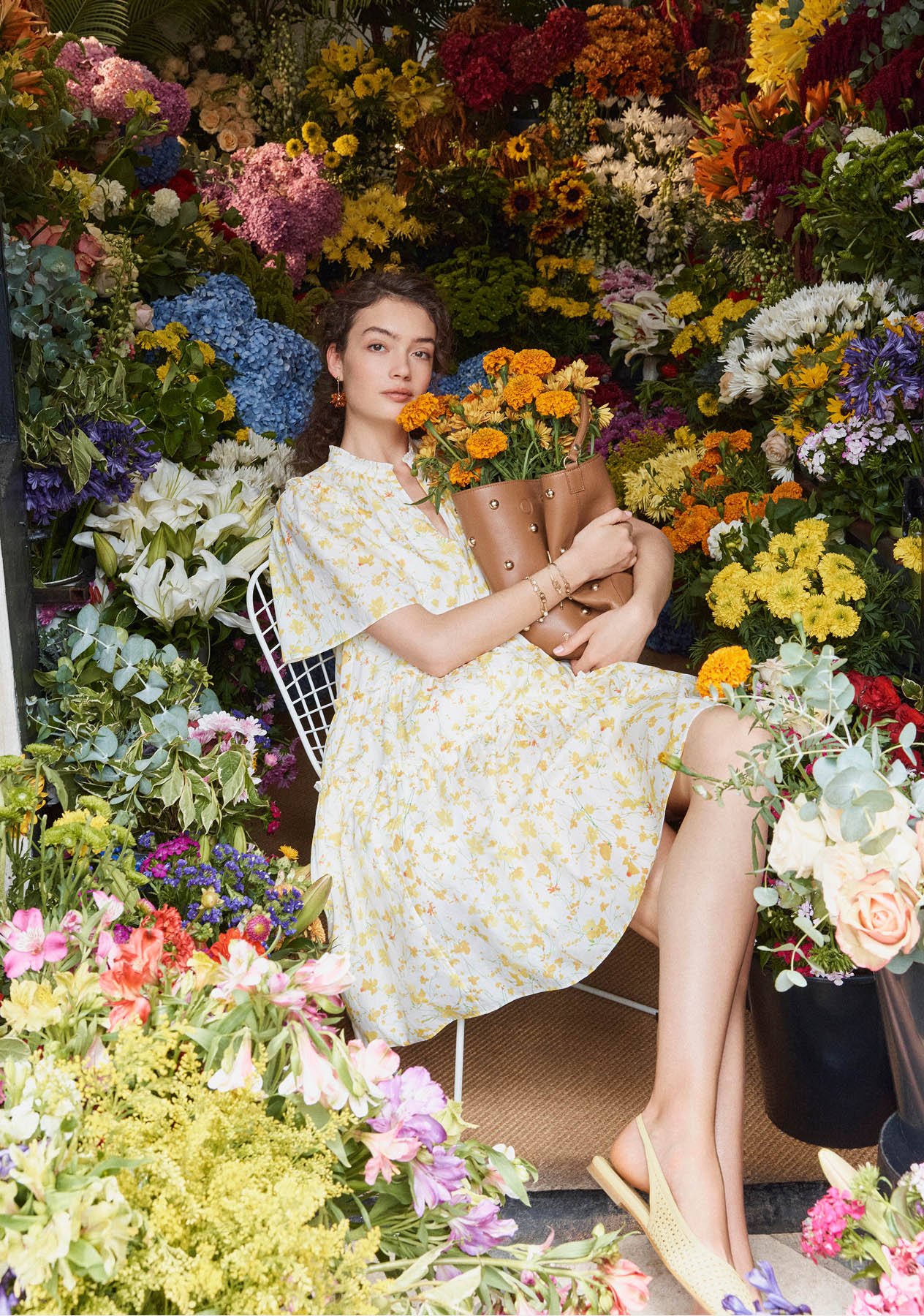 Model photographed in a floral dress.