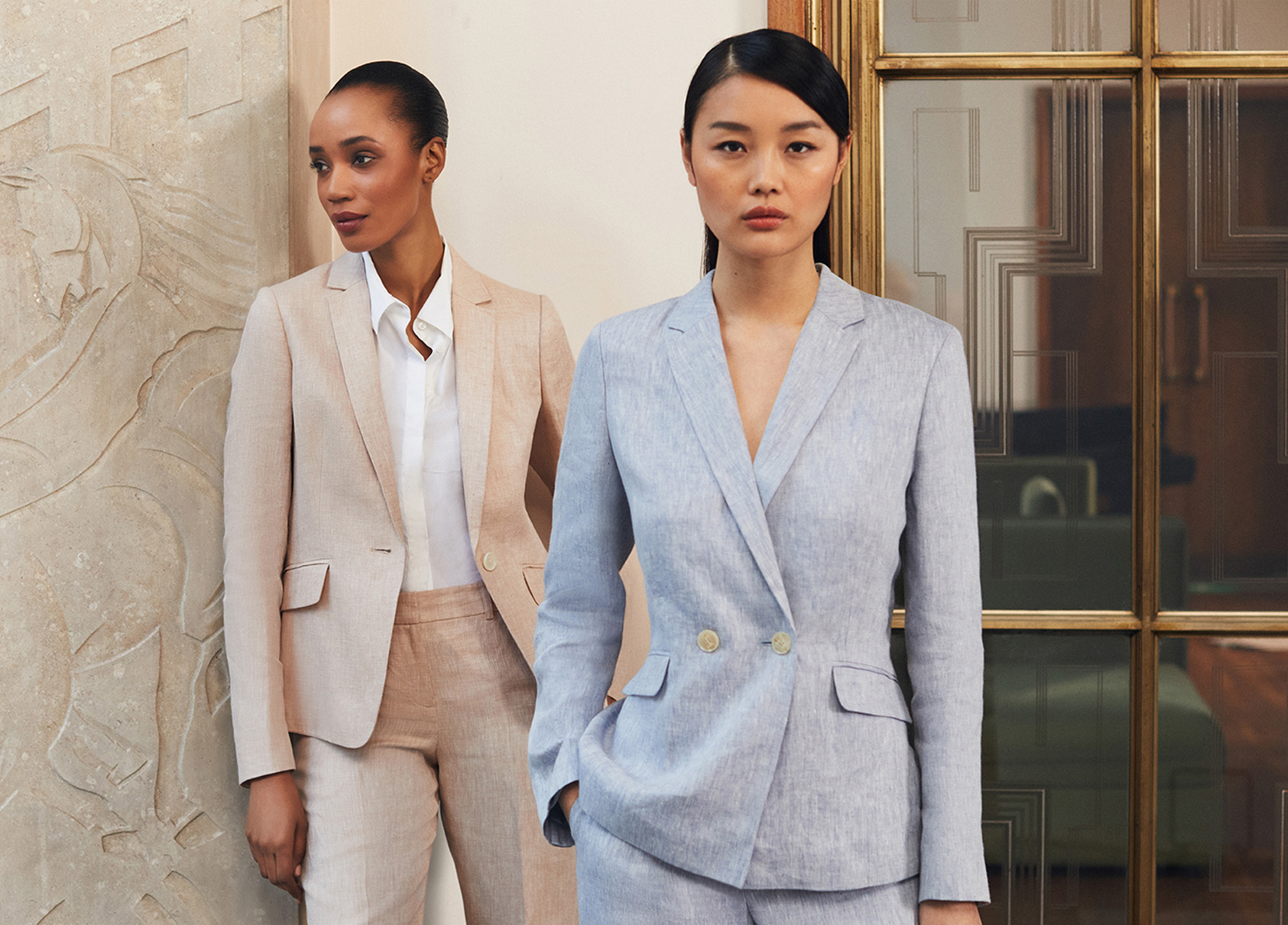 Hobbs models wear linen suits. Hobbs models wear linen suits.