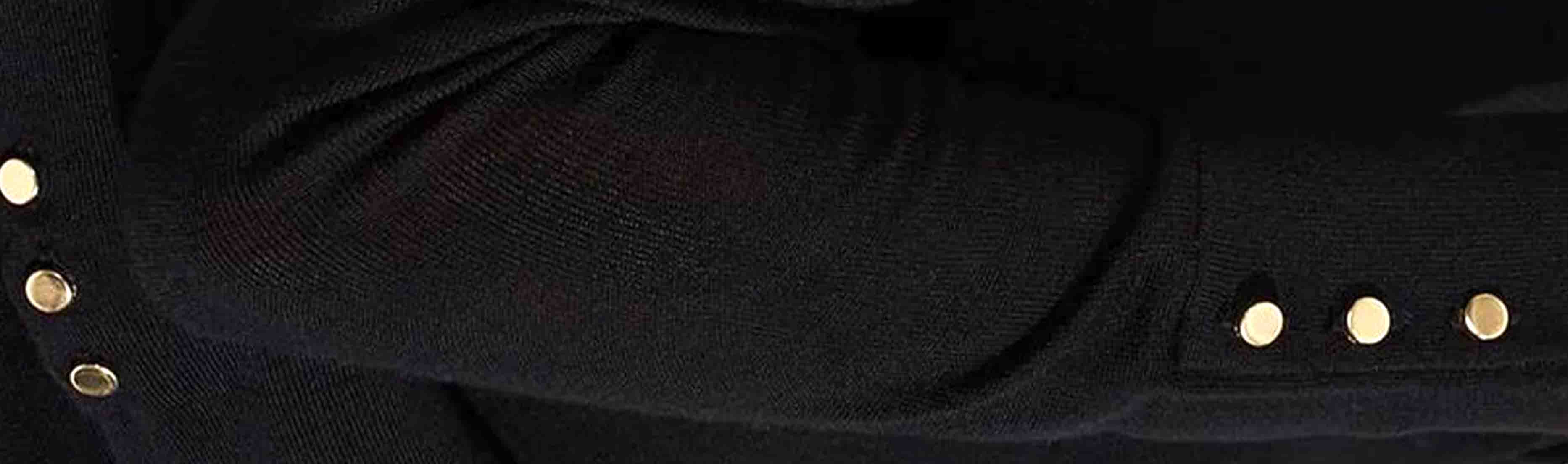 Close-up of the cuff detail on a Merino wool jumper.