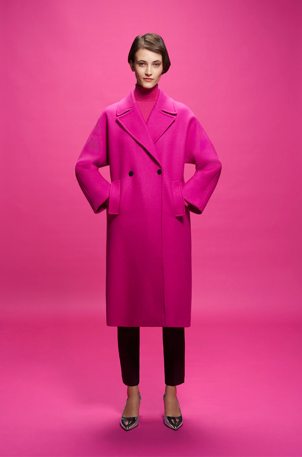 Model photographed against a pink backdrop wearing pink clothing styled in different ways.