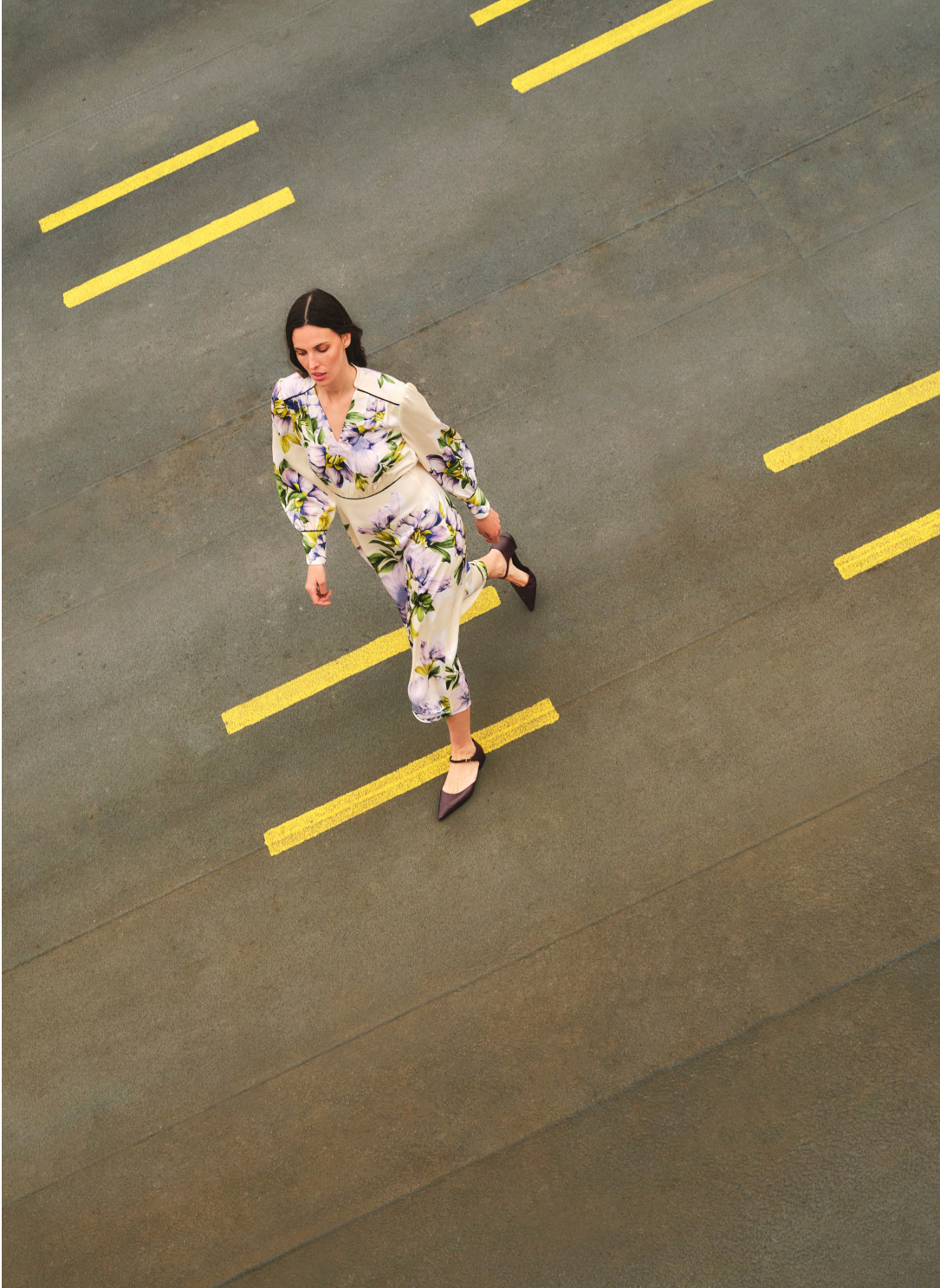 Model photographed in floral dress.