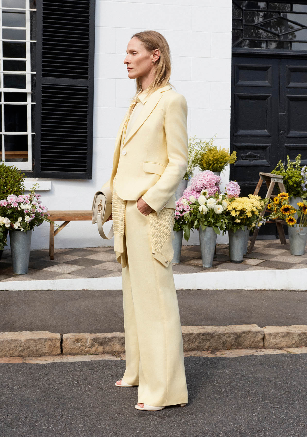 Women wearing Hobbs’ butter yellow edit.