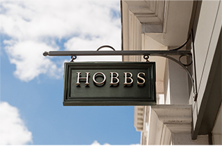 A Hobbs sign outside a Hobbs store.