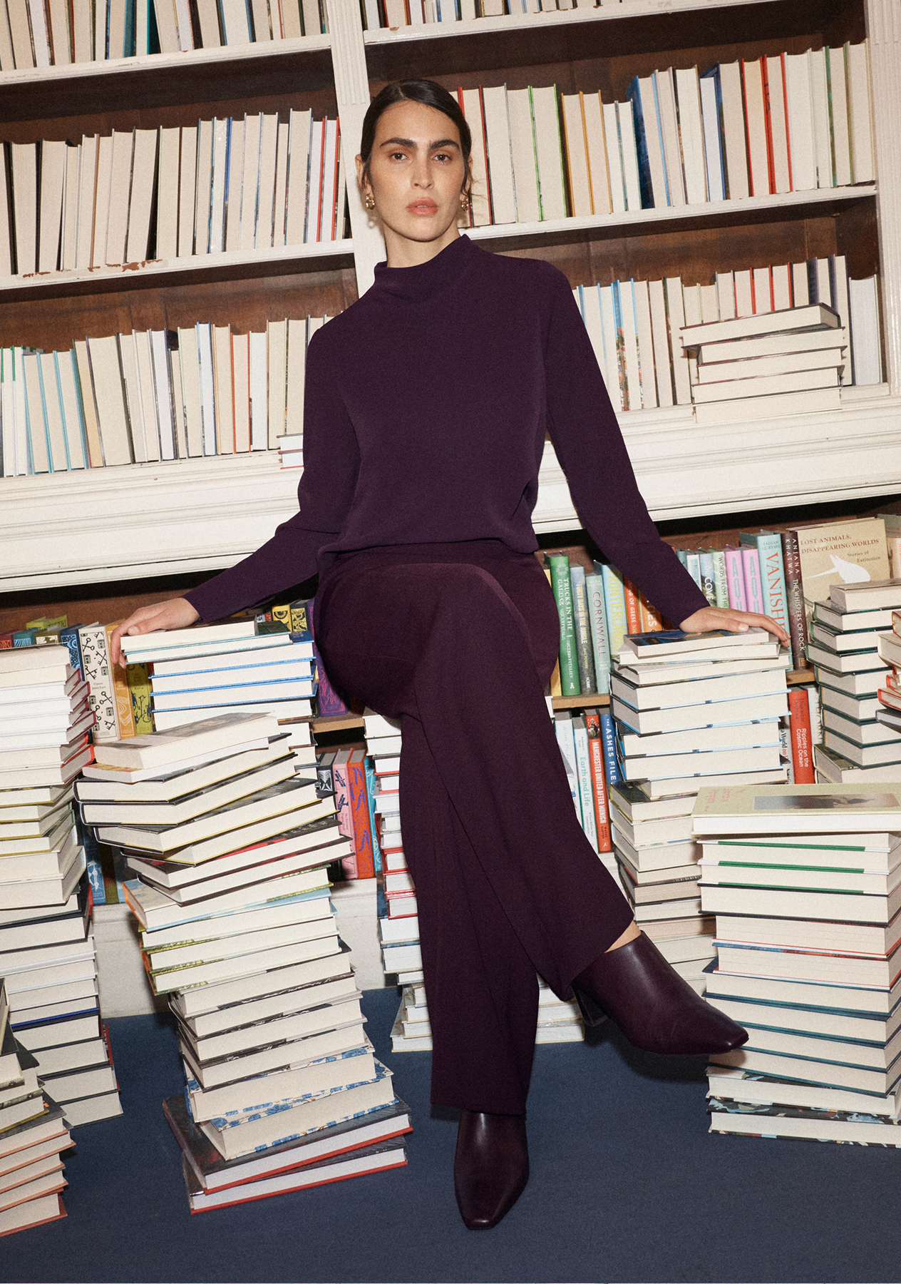 A woman showcasing Hobbs capsule wardrobe essentials.