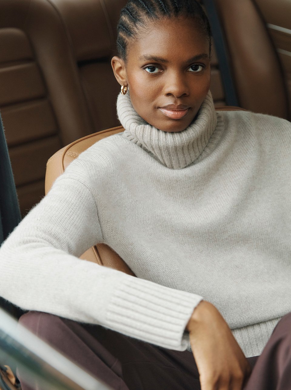 A woman wearing a Hobbs trench coat.