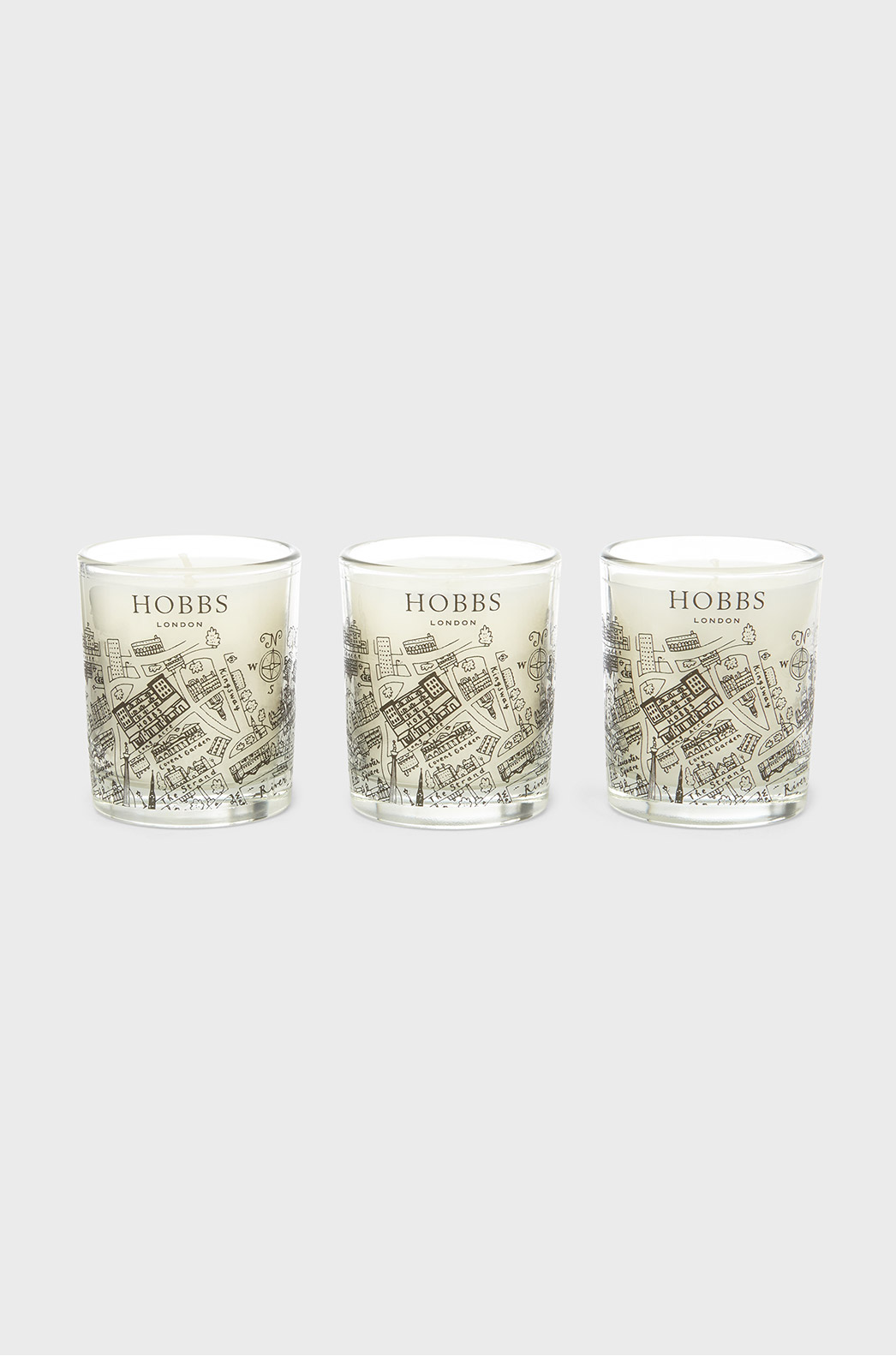 Set of three Hobbs candles presented in glass jars with illustrations of Hampstead.