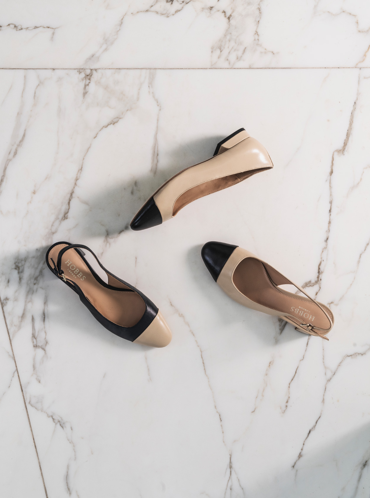 Hobbs women's flat shoes in nude and black.