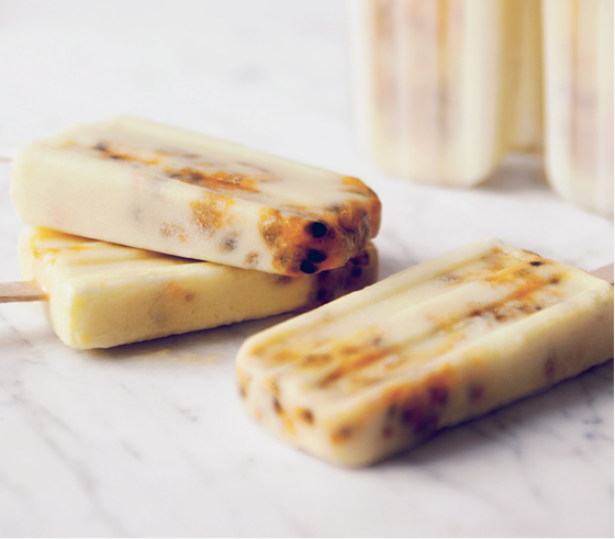 Sarah Britton's piña colada ice lollies in an ice lolly rack