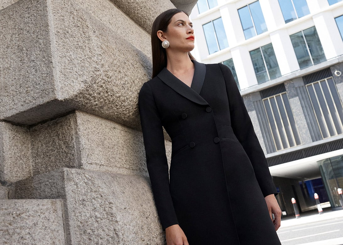 Model photographed with a black dress.