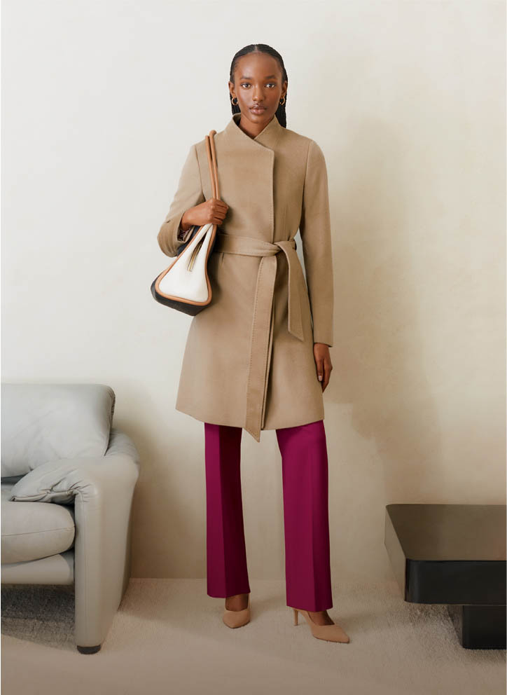 MODEL WEARING HOBBS CAMEL WOOL COAT