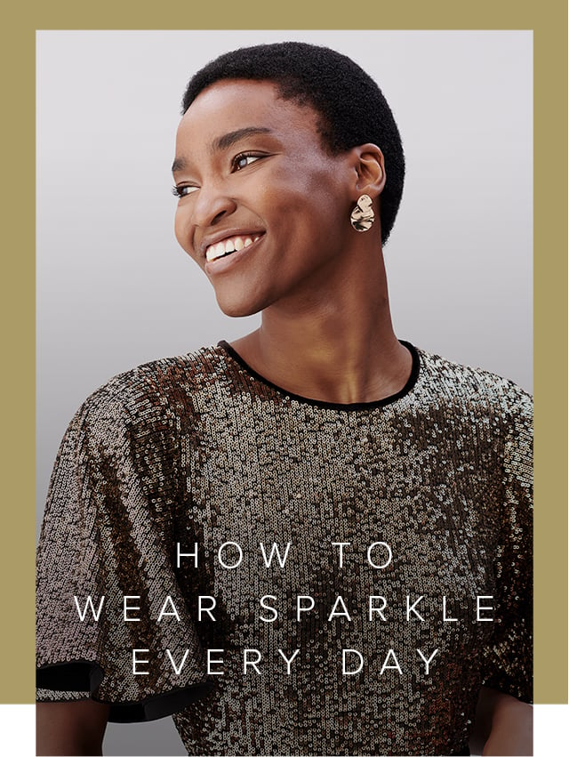 Model wears a sequin-embellished dress and earrings from Hobbs.