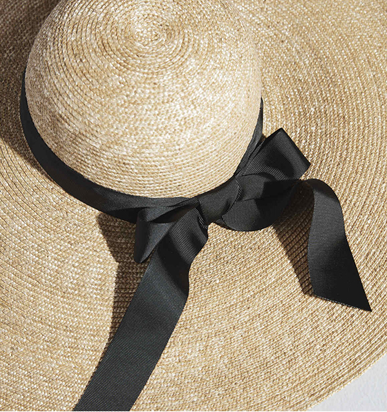 Swap your accessories,a woven sun hat will be useful in the summer months.