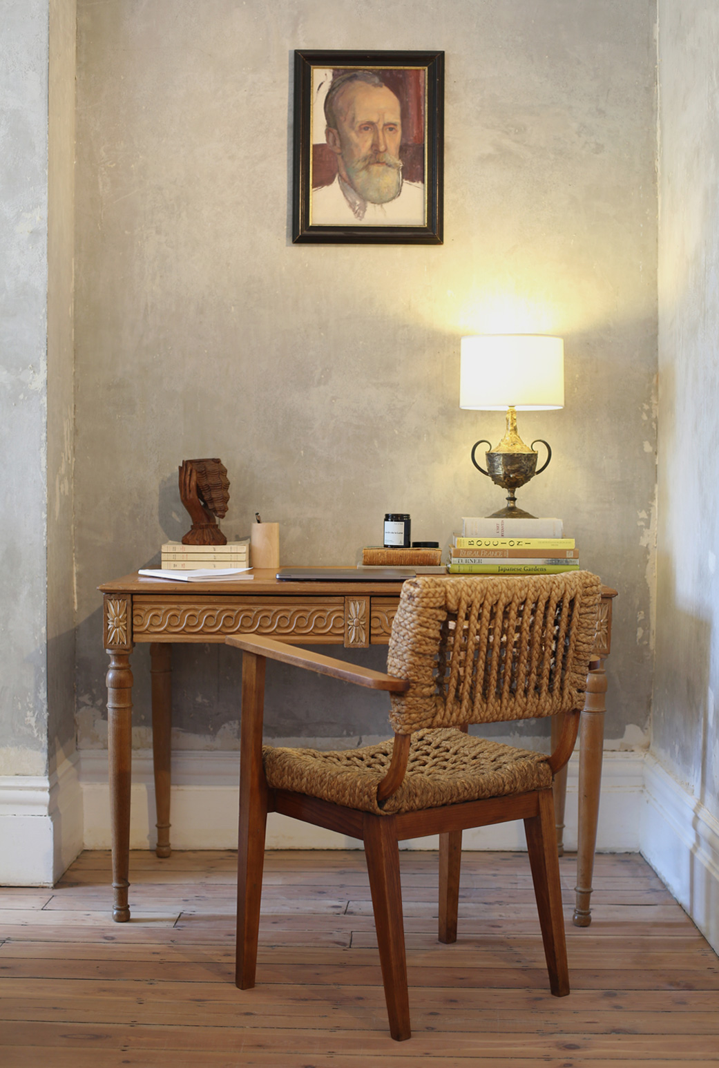 Working from home, featuring a desk and french mid-century chair.