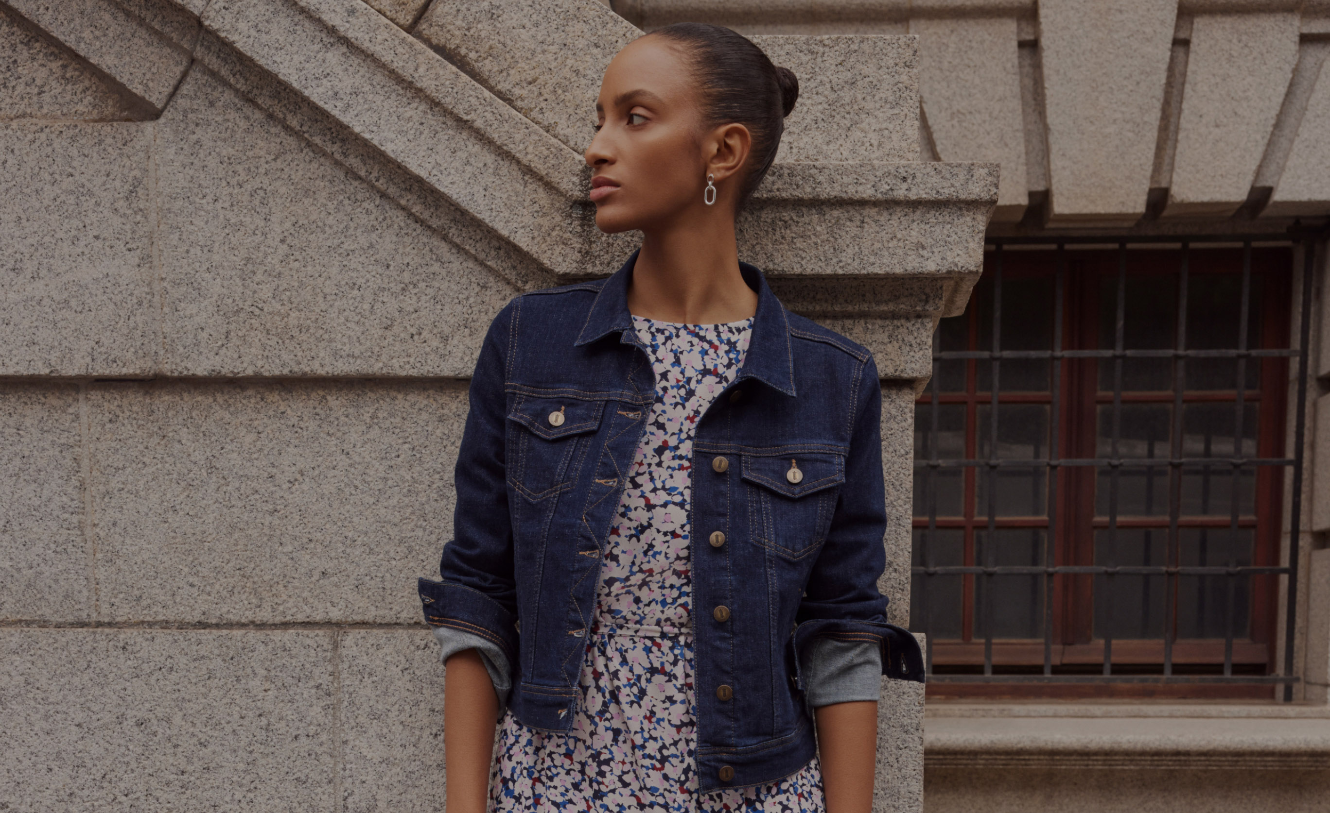 Gif of model wearing bootcut fit jeans with a puffer jacket