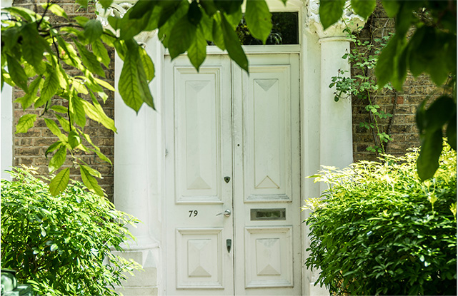 The white double front door of our copywriter, Hannah's London home.