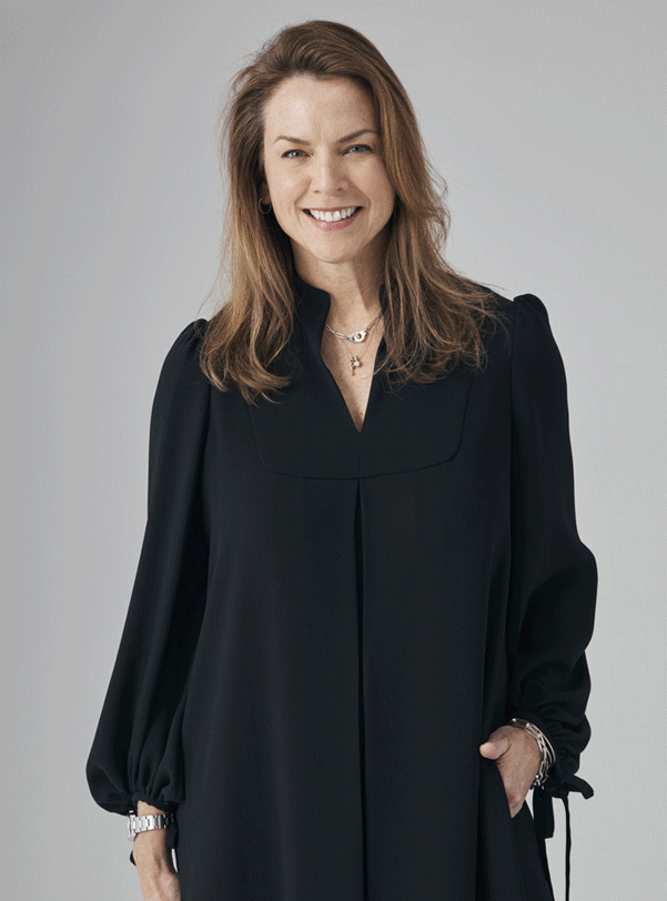 Hobbs Product Director, Sally Ambrose pictured in the loose black, Natasha Dress. 