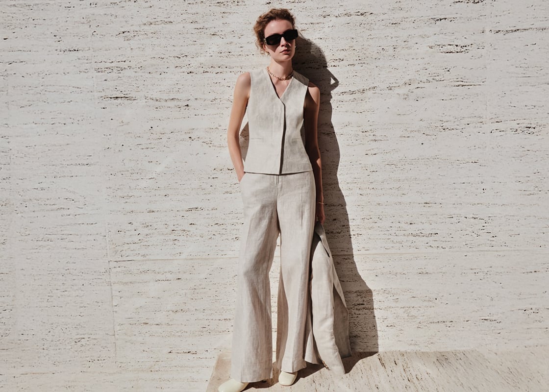 An image of a model wearing a beige Hobbs’ linen suit.