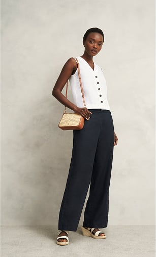 Women wearing Hobbs holiday outfits.