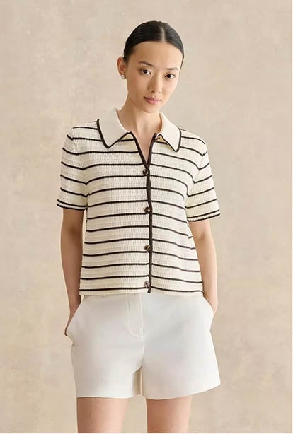 A woman wearing a Hobbs dress.