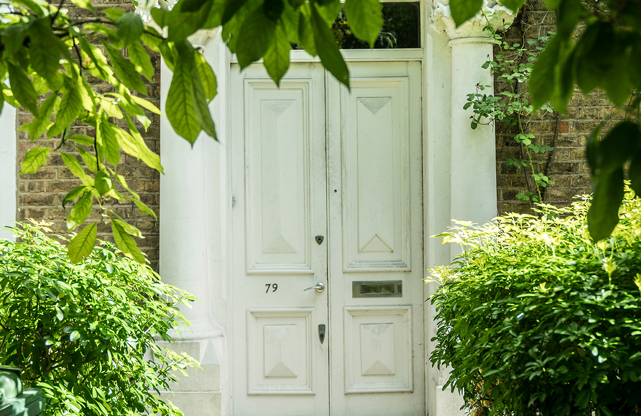 The white double front door of our copywriter, Hannah's London home.