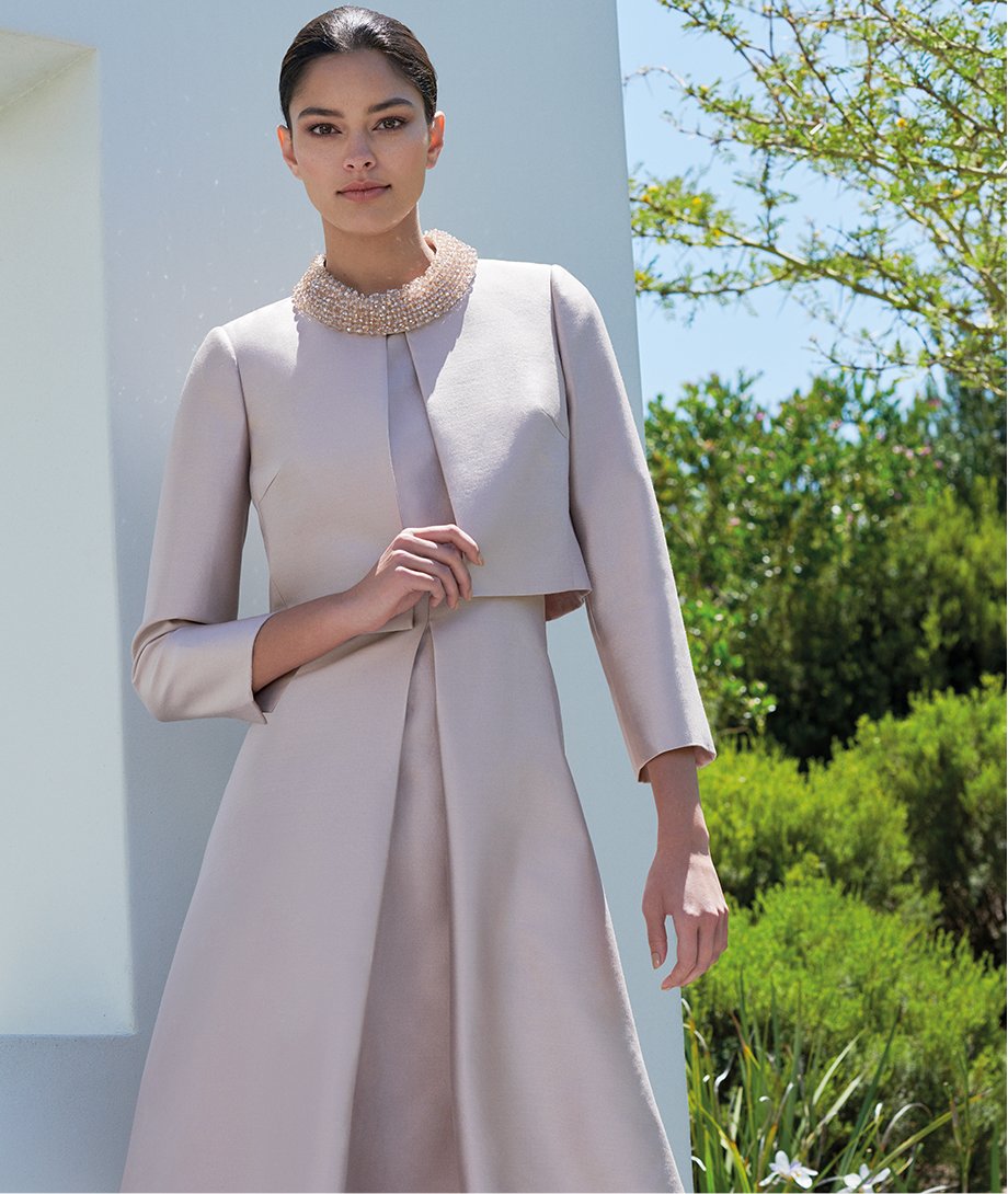 Pink embellished occasion dress with a matching pink jacket by Hobbs.