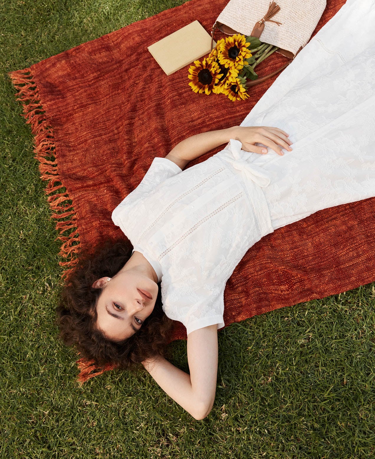 A woman wearing a Hobbs summer dress