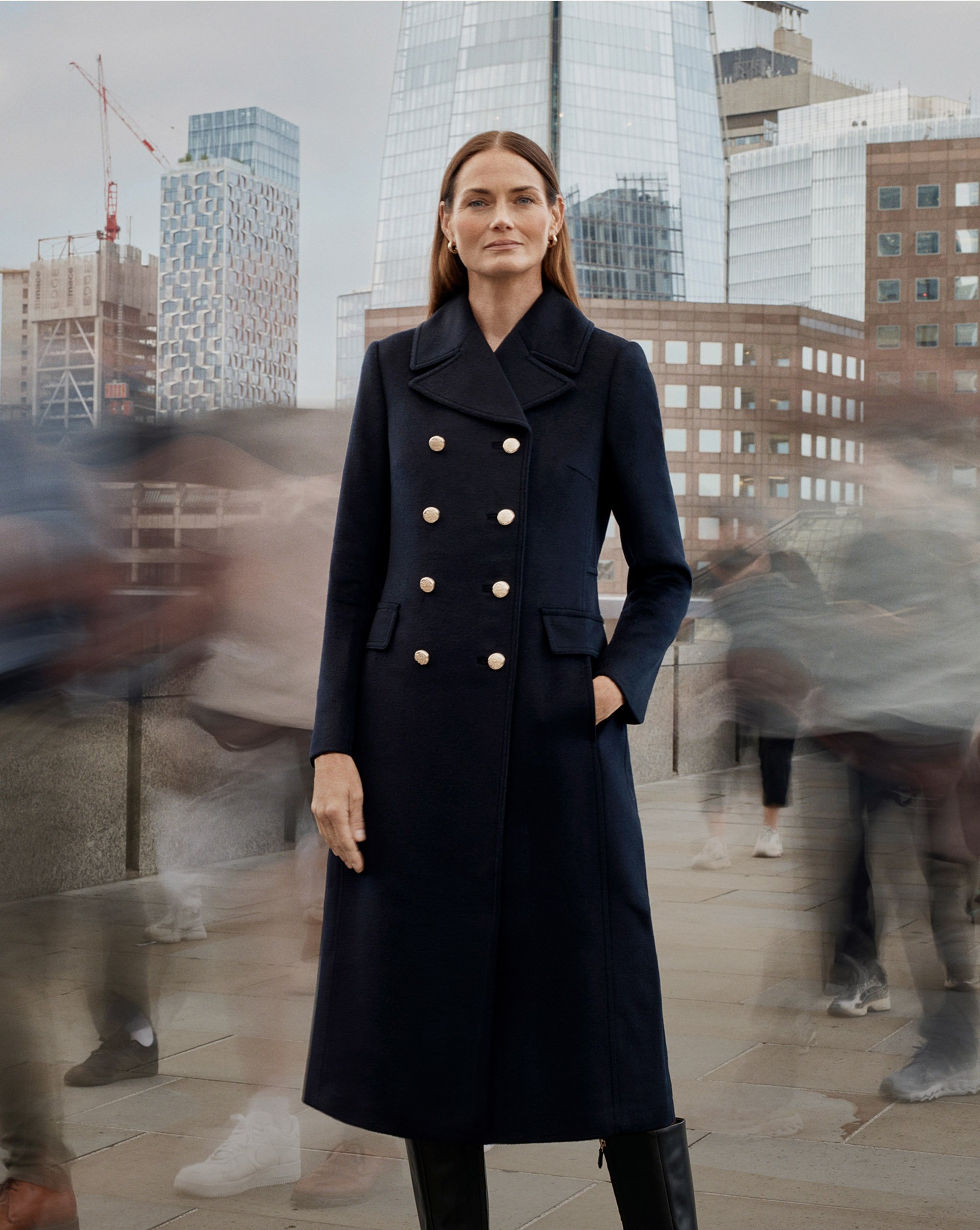 Three women wearing Hobbs coats.