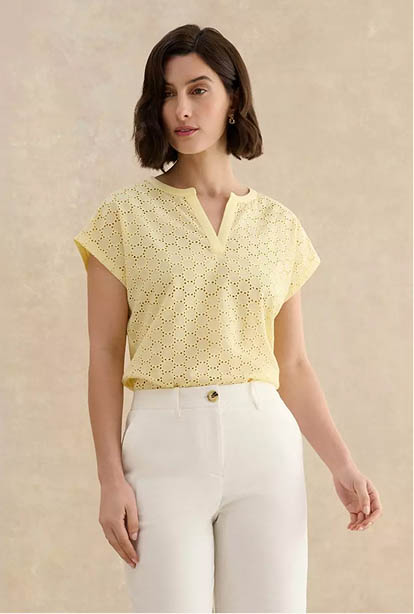 A woman wearing a Hobbs dress.