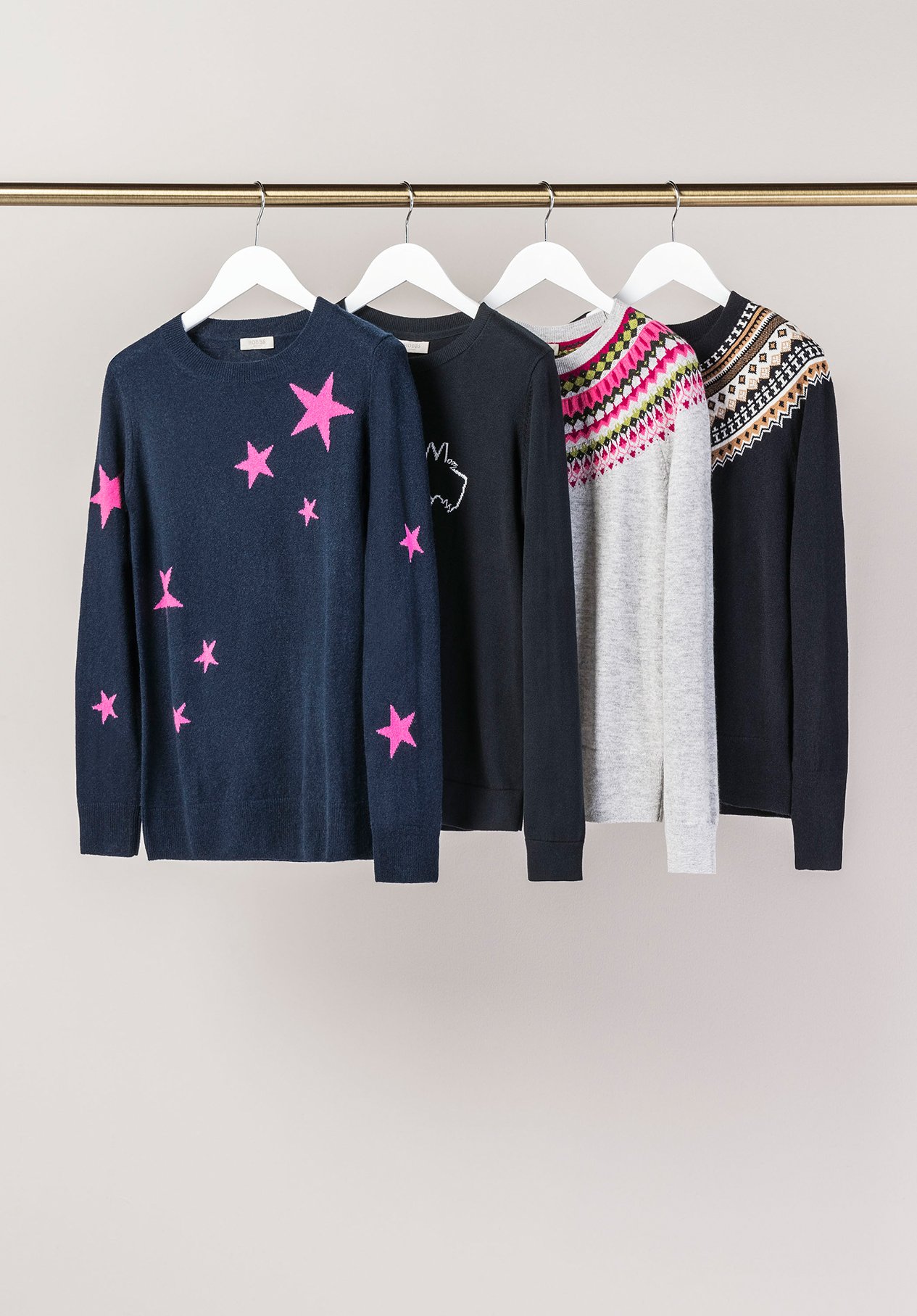 A rail of festive jumpers from Hobbs.