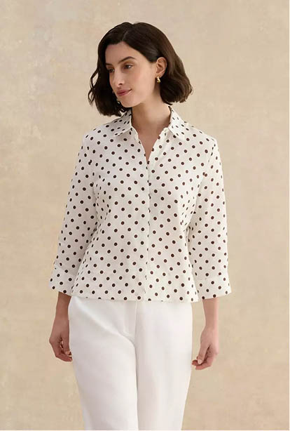 A woman wearing a Hobbs dress.