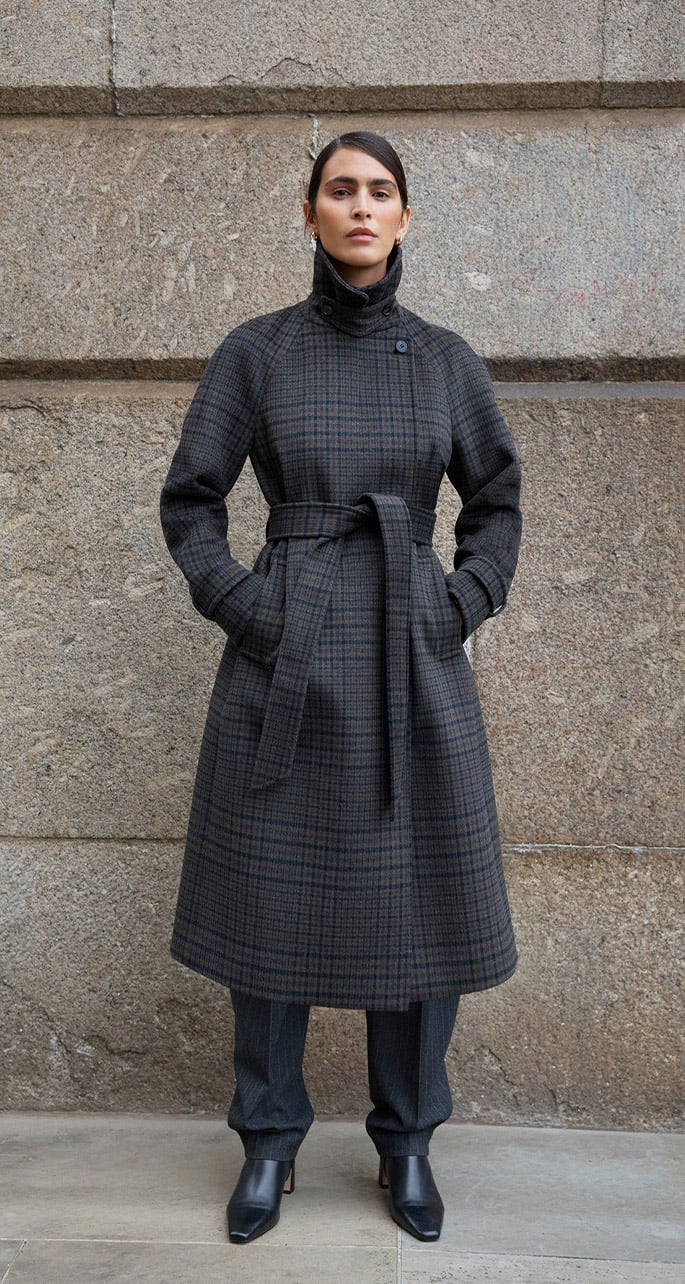 A woman wearing a Hobbs wool coat.