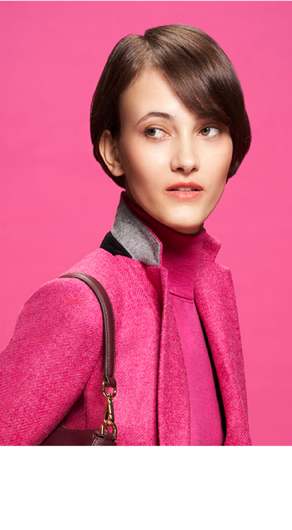 Model photographed against a pink backdrop wearing pink clothing styled in different ways.