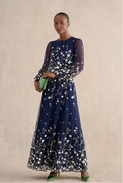 A woman wearing a Hobbs dress.