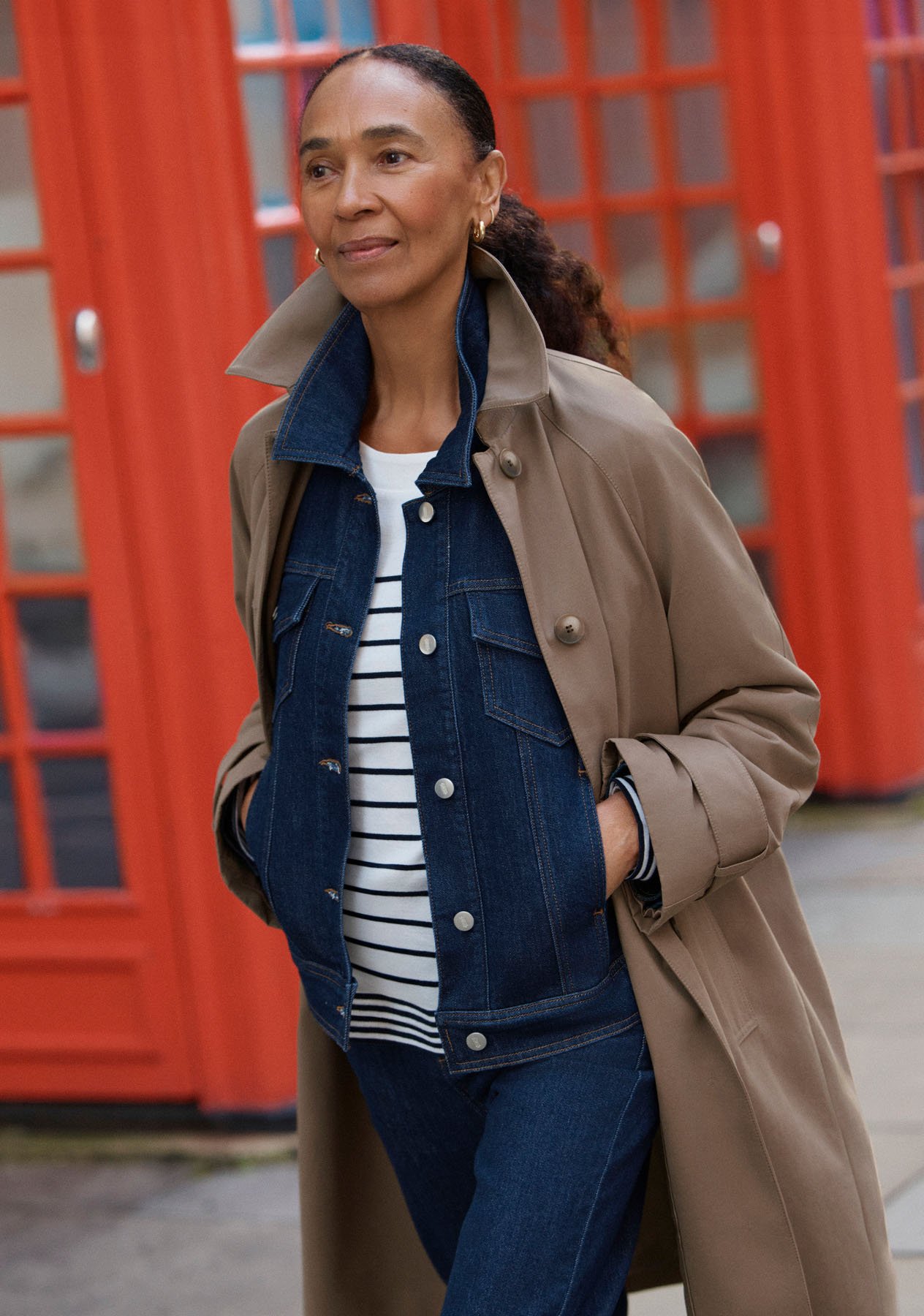 Women wearing different trench coats.